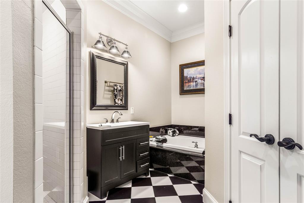 40 Enclave Court Waco, TX 76708 - Photo 31 of 40 a bathroom with a sink and a mirror