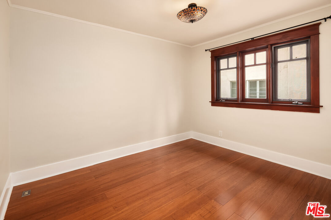 1436 Silver Boulevard Los Angeles, CA 90026 - Photo 16 of 31 wooden floor in an empty room