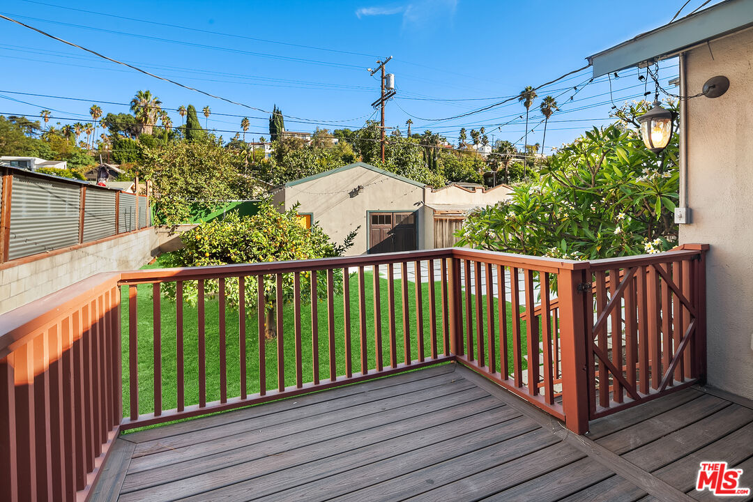 1436 Silver Boulevard Los Angeles, CA 90026 - Photo 21 of 31 a view of a balcony with wooden floor