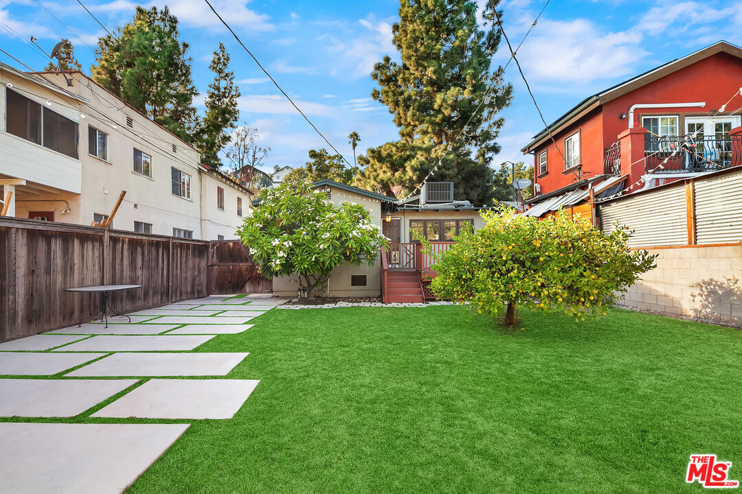 1436 Silver Boulevard Los Angeles, CA 90026 - Photo 30 of 31 a view of a house with a yard
