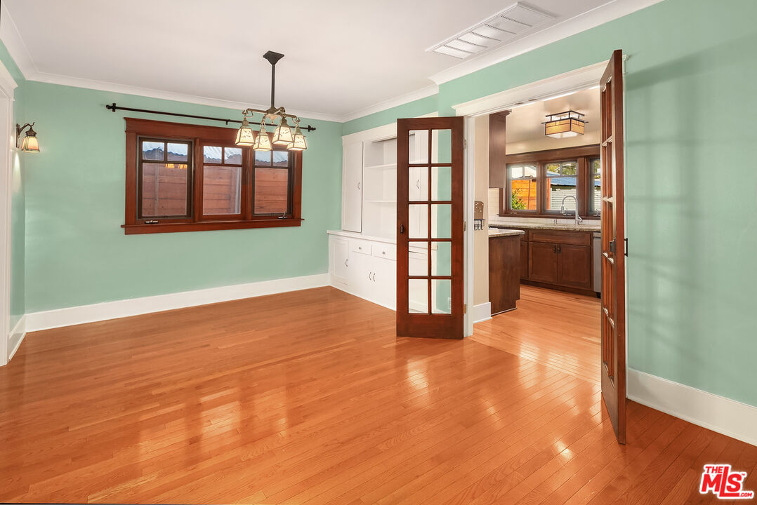 1436 Silver Boulevard Los Angeles, CA 90026 - Photo 9 of 31 a view of an empty room with window and cabinet