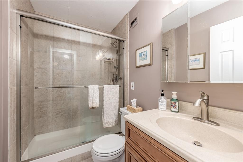 1150 Bower Hill Road, Unit 510B Pittsburgh, PA 15243 - Photo 23 of 25 a bathroom with a sink toilet and shower