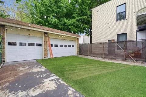 a view of a back yard of the house