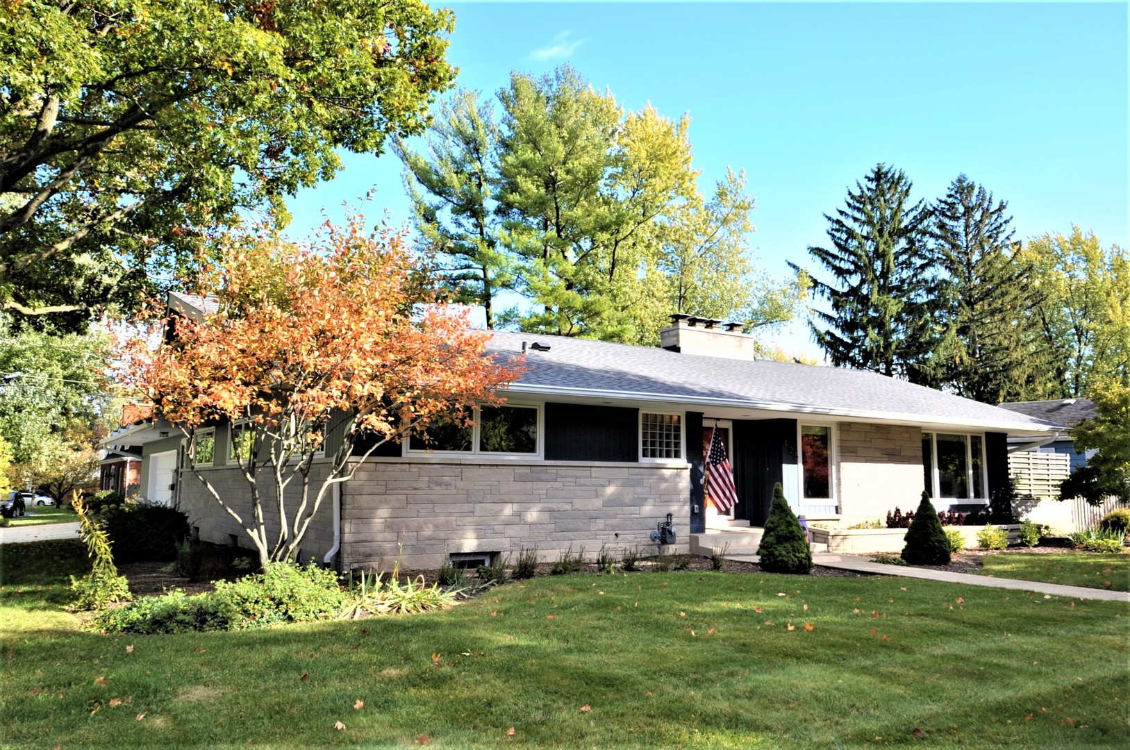 425 Maple Lane Geneva, IL 60134 - Photo 1 of 48 a front view of a house with a garden