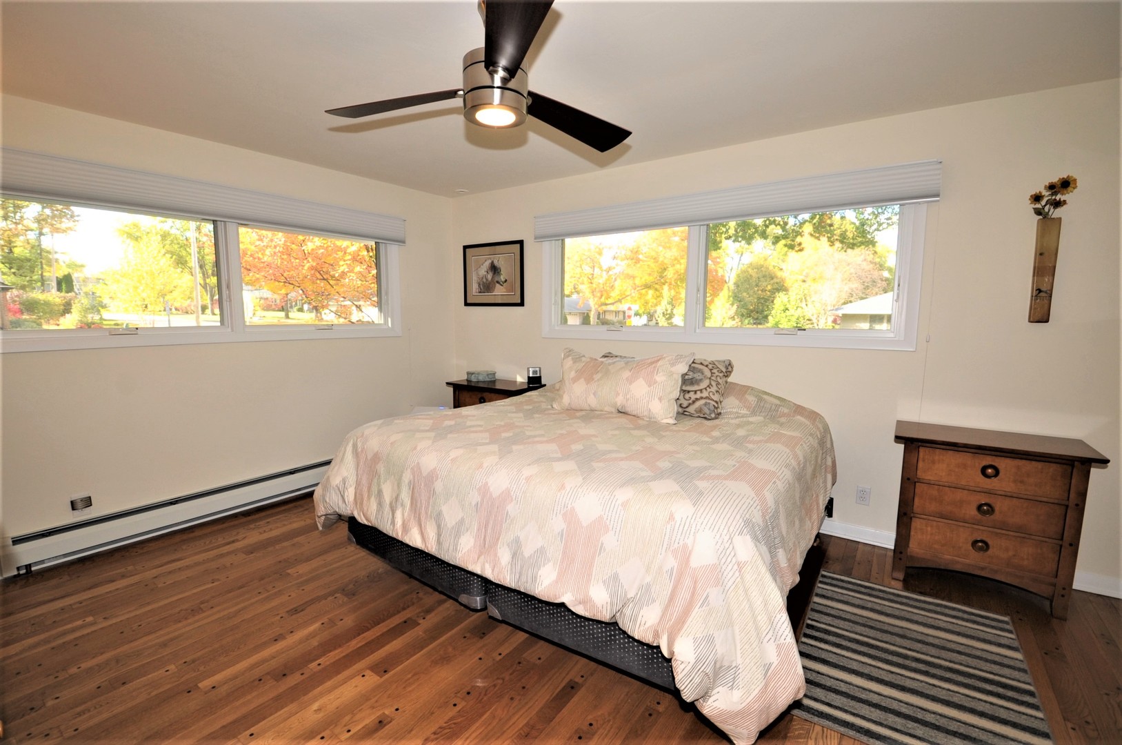 425 Maple Lane Geneva, IL 60134 - Photo 22 of 48 a bedroom with a bed and a window