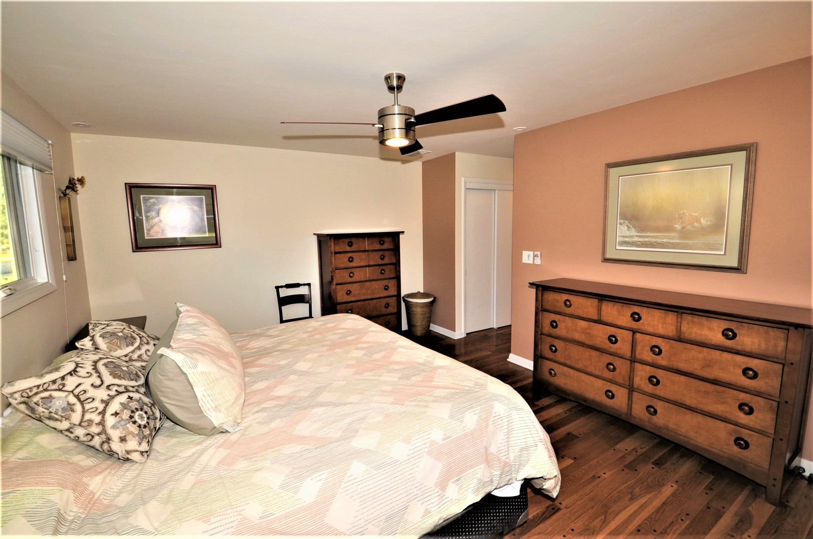 425 Maple Lane Geneva, IL 60134 - Photo 23 of 48 a bedroom with a bed and a dresser