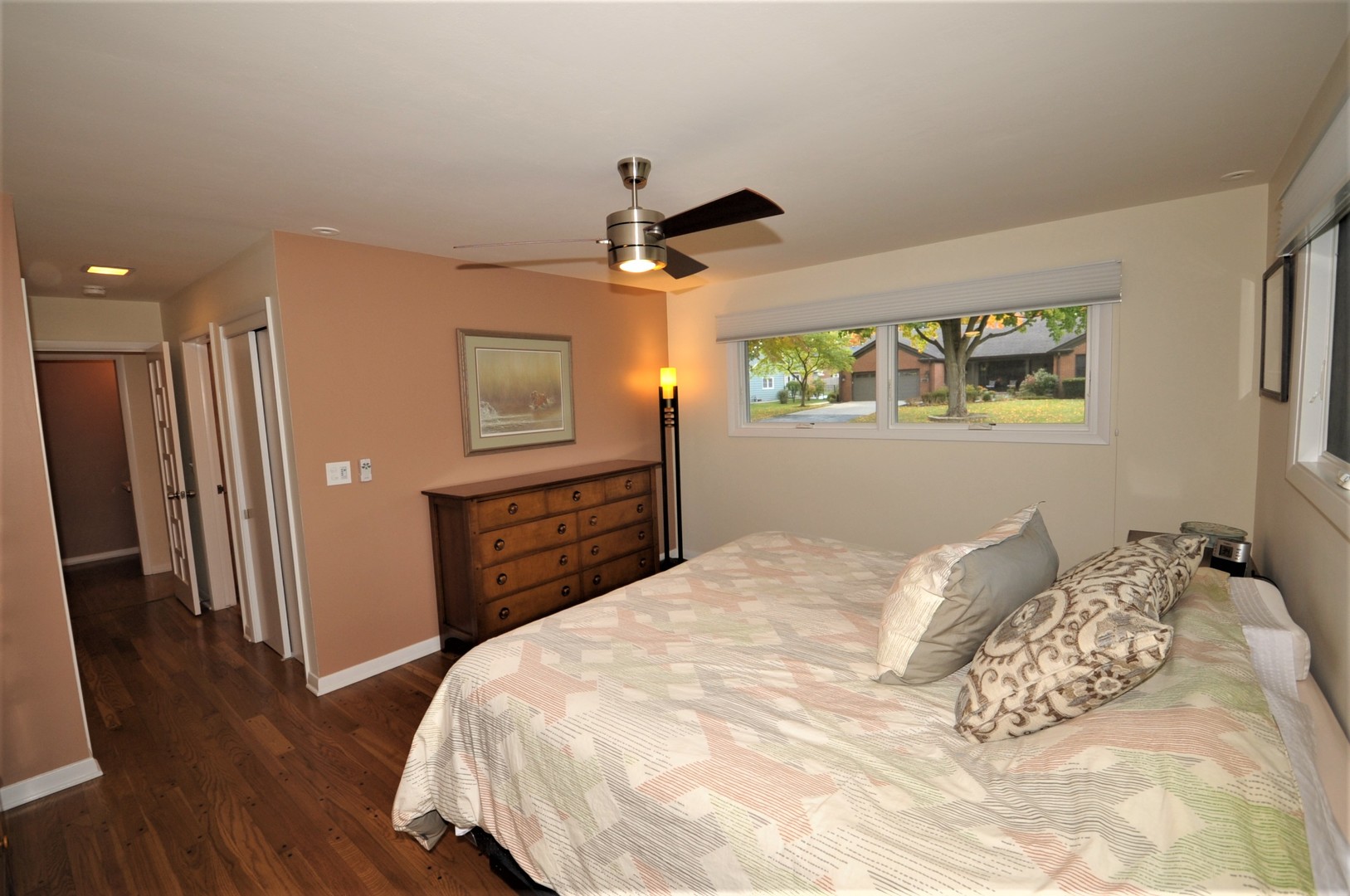 425 Maple Lane Geneva, IL 60134 - Photo 24 of 48 a bedroom with a bed dresser and a flat tv screen