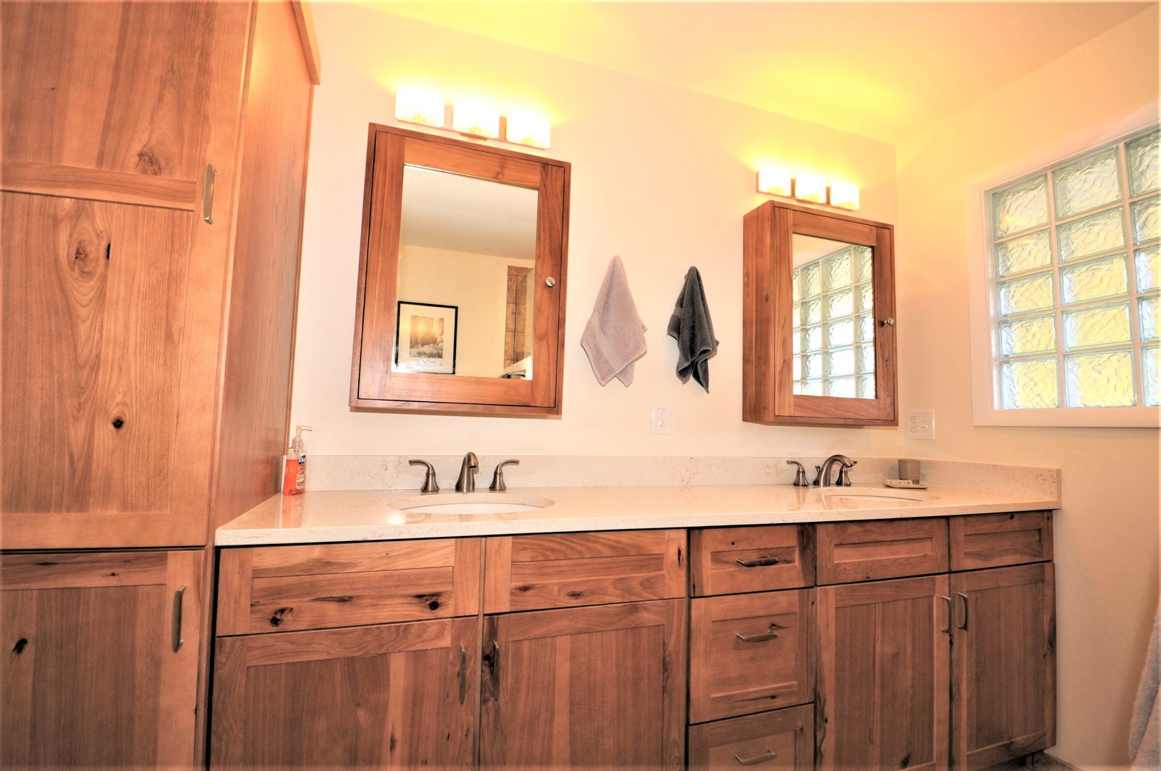 425 Maple Lane Geneva, IL 60134 - Photo 26 of 48 a bathroom with a double vanity sink and a mirror