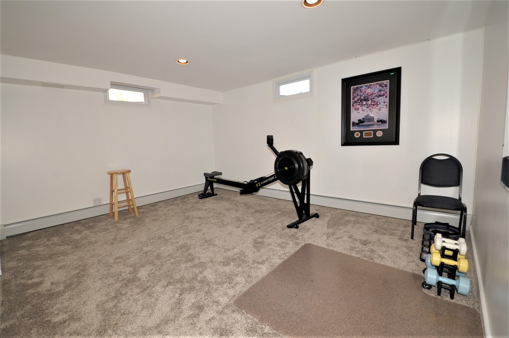 425 Maple Lane Geneva, IL 60134 - Photo 43 of 48 a room with gym equipment and a wooden floor