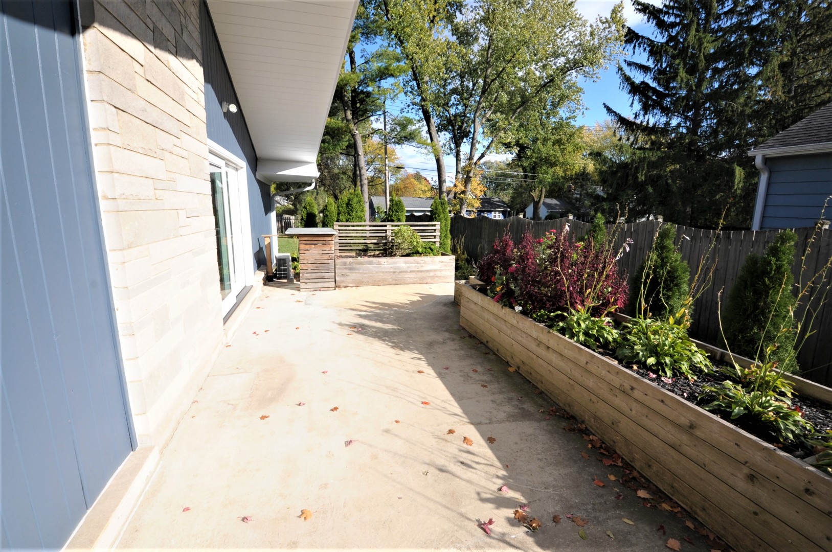 425 Maple Lane Geneva, IL 60134 - Photo 8 of 48 a view of a pathway with a bench