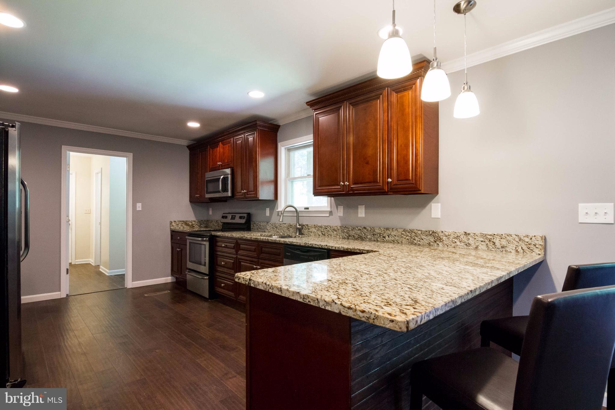 13523 Stonehouse Mountain Road Culpeper, VA 22701 - Photo 9 of 30 Check out those gorgeous cabinets!