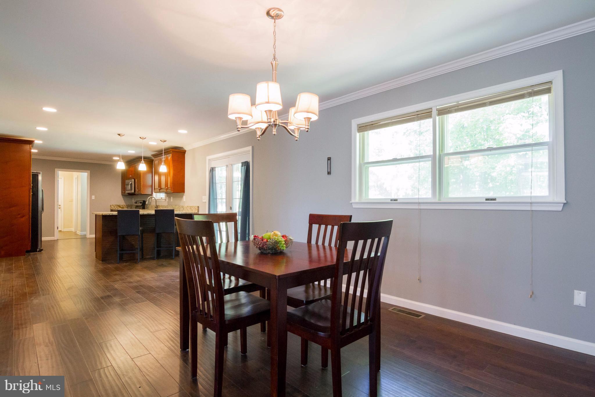 13523 Stonehouse Mountain Road Culpeper, VA 22701 - Photo 10 of 30 Spacious Dining Room with Fireplace