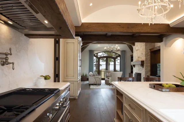 a kitchen with a stove and a refrigerator