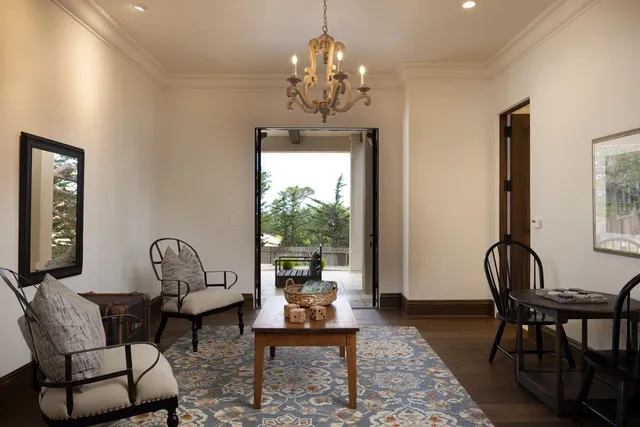 a view of a dining room with furniture window and outside view