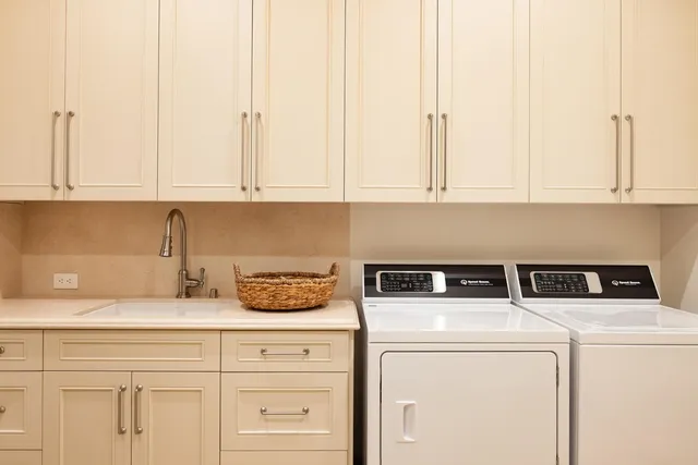 a front view of a house with a yard outdoor seating and barbeque oven