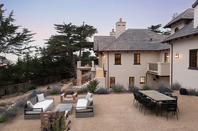 a view of a house with snow on the background