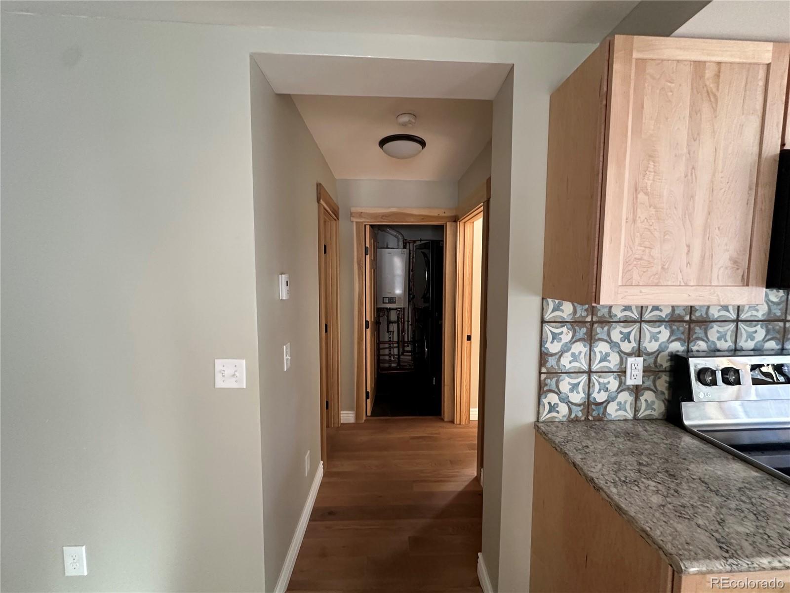 900 Rose Street Georgetown, CO 80444 - Photo 11 of 23 a view of a kitchen cabinets a counter top space and a window