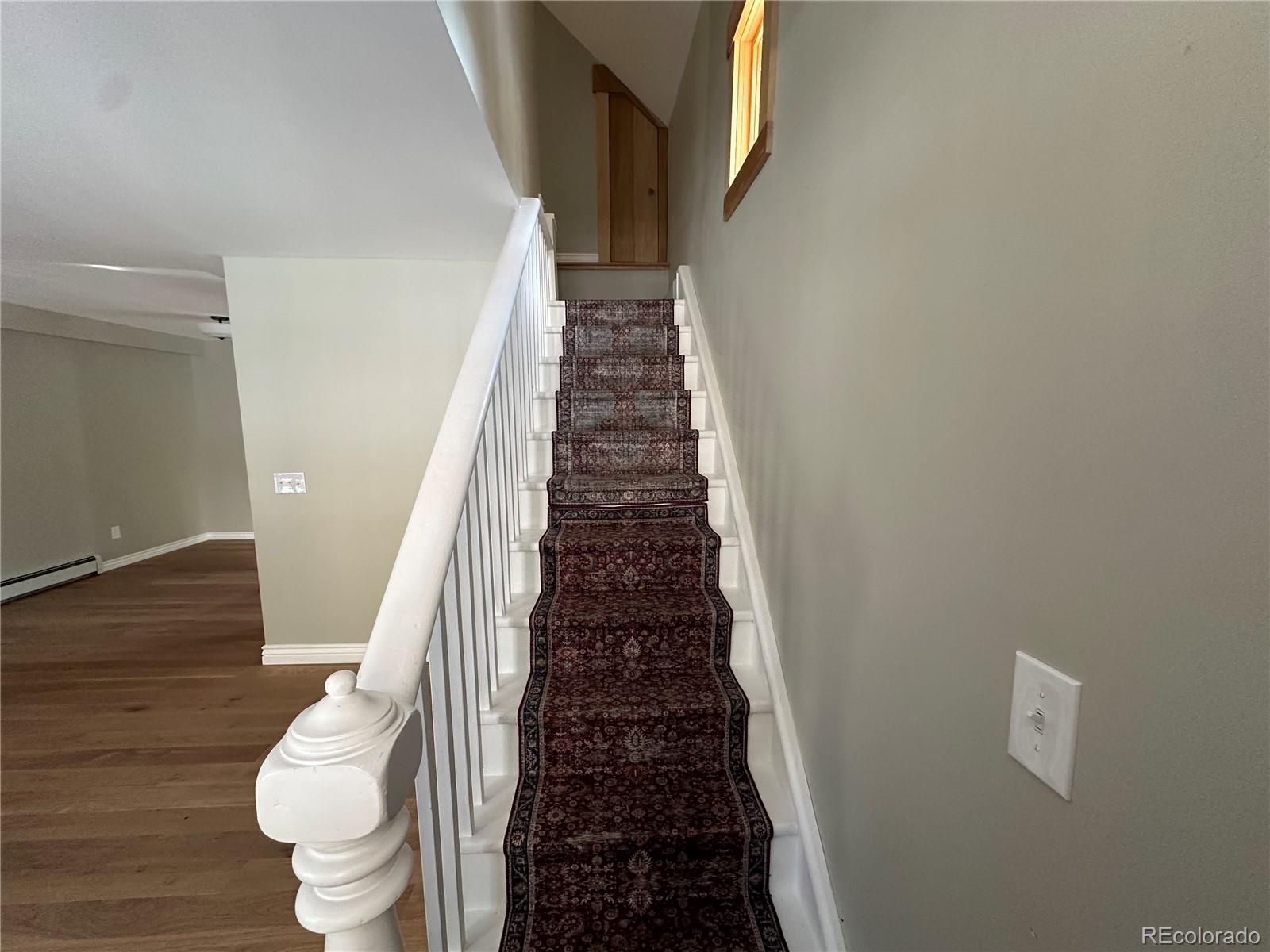 900 Rose Street Georgetown, CO 80444 - Photo 16 of 23 a view of entryway with wooden floor