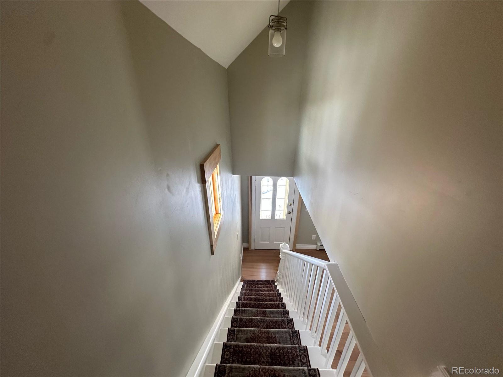 900 Rose Street Georgetown, CO 80444 - Photo 21 of 23 a view of entryway and hall with wooden floor