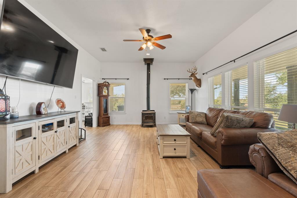 1013 Highland Road Cleburne, TX 76033 - Photo 6 of 33 a living room with furniture and a large window