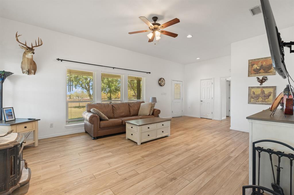 1013 Highland Road Cleburne, TX 76033 - Photo 7 of 33 a living room with furniture and a window