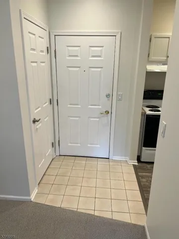 a view of a kitchen with storage and utility