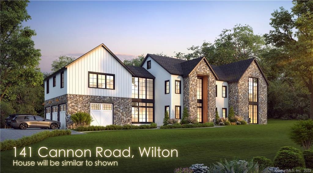 141 Cannon Road Wilton, CT 06897 - Photo 1 of 1 a front view of a house with a garden