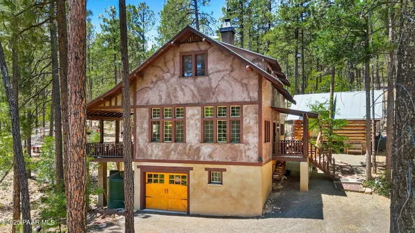 a front view of a house with yard