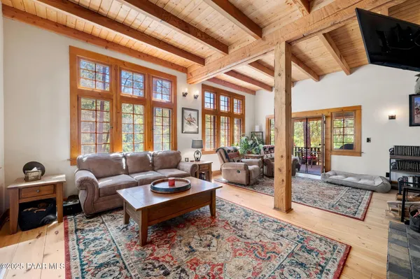 a living room with furniture or couch and a table