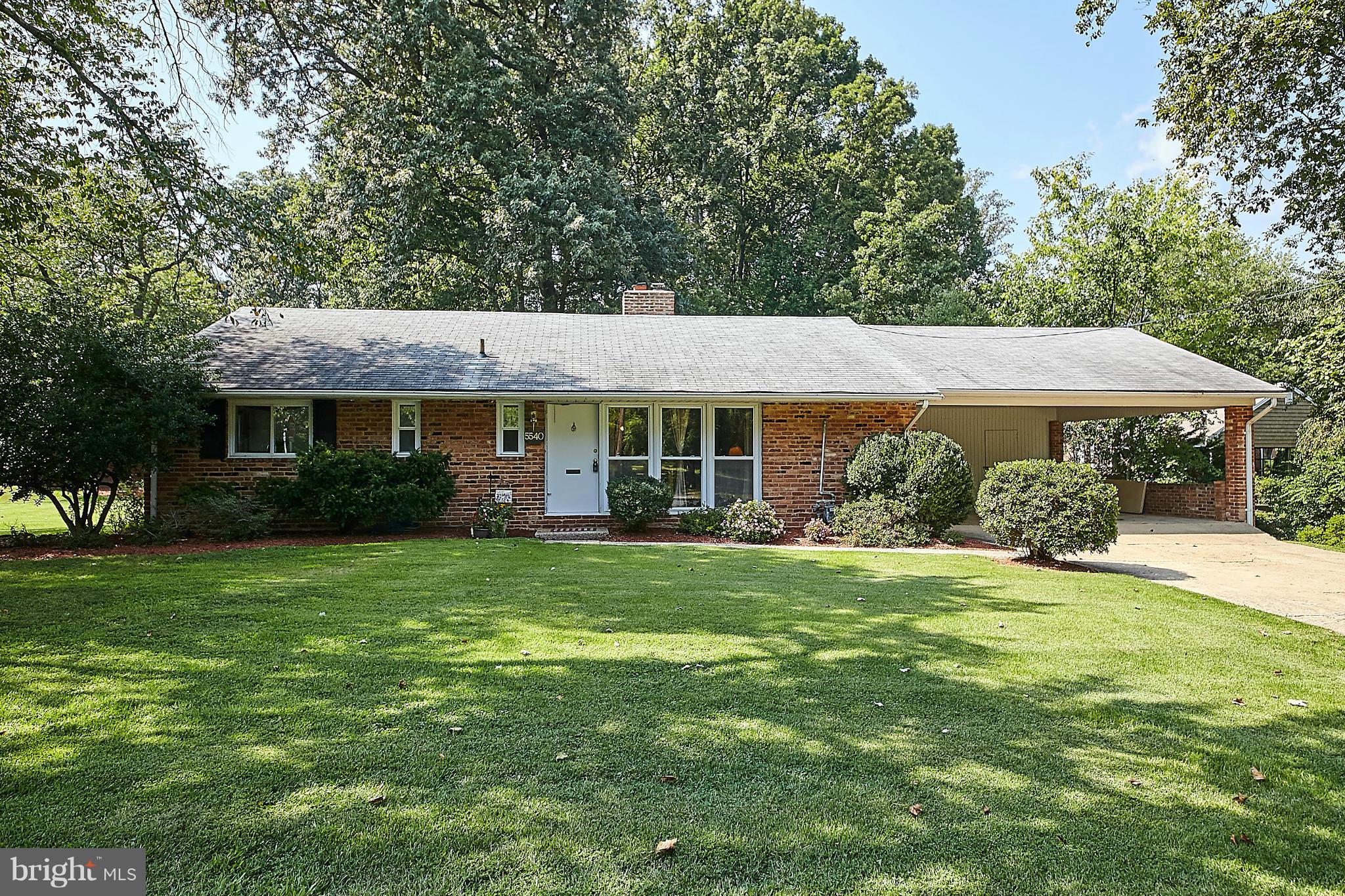 5540 Earlehurst Street Springfield, VA 22151 - Photo 1 of 30 a view of a house with a backyard