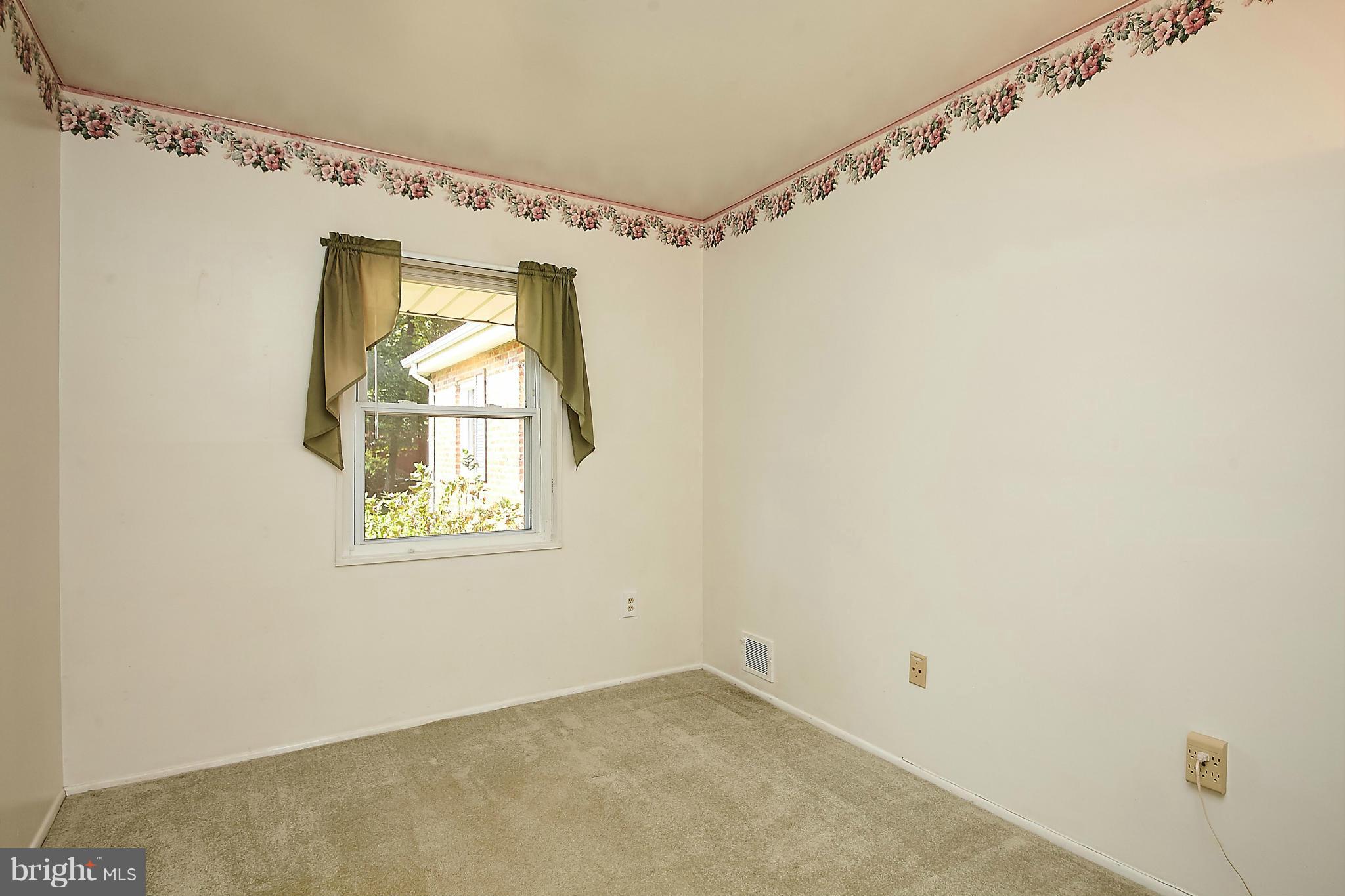 5540 Earlehurst Street Springfield, VA 22151 - Photo 18 of 30 a view of a window in an empty room