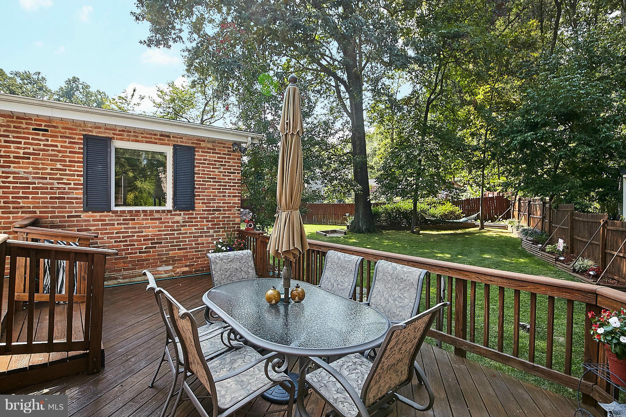 5540 Earlehurst Street Springfield, VA 22151 - Photo 24 of 30 a view of a house with backyard and sitting area