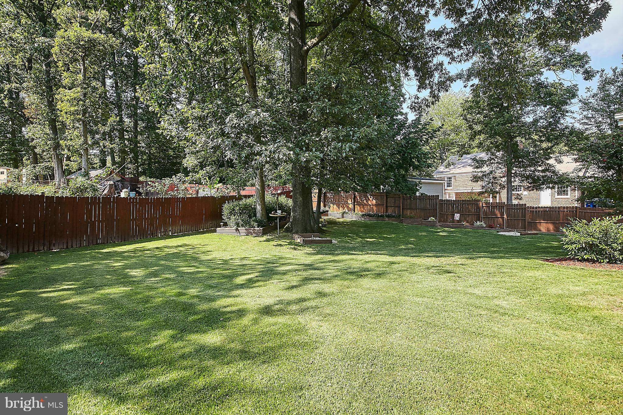 5540 Earlehurst Street Springfield, VA 22151 - Photo 28 of 30 a backyard of a house with lots of green space