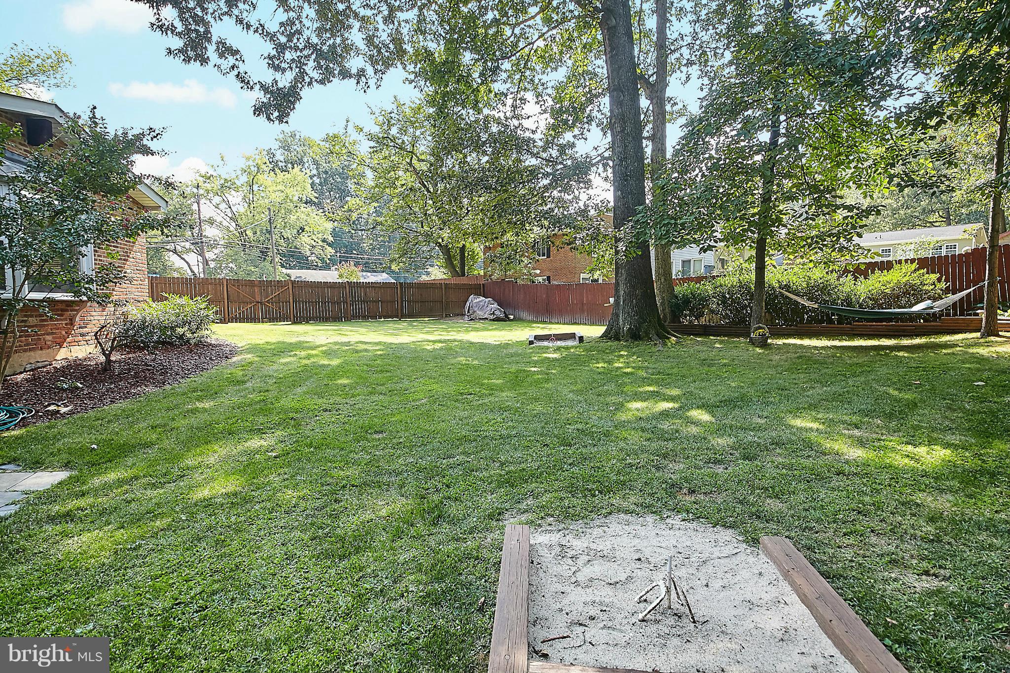 5540 Earlehurst Street Springfield, VA 22151 - Photo 30 of 30 a backyard of a house with lots of green space