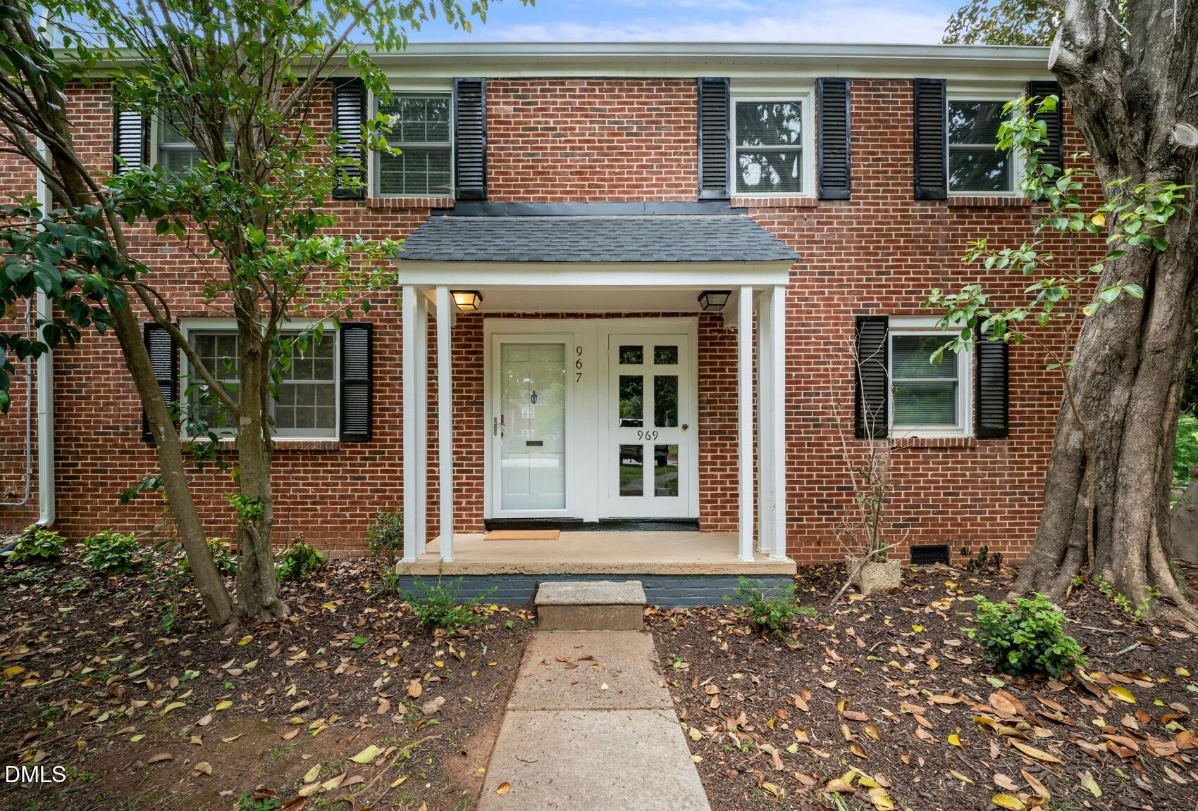 967 St Marys Street Raleigh, NC 27605 - Photo 3 of 34 a front view of a house with garden