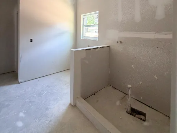 an empty room with windows