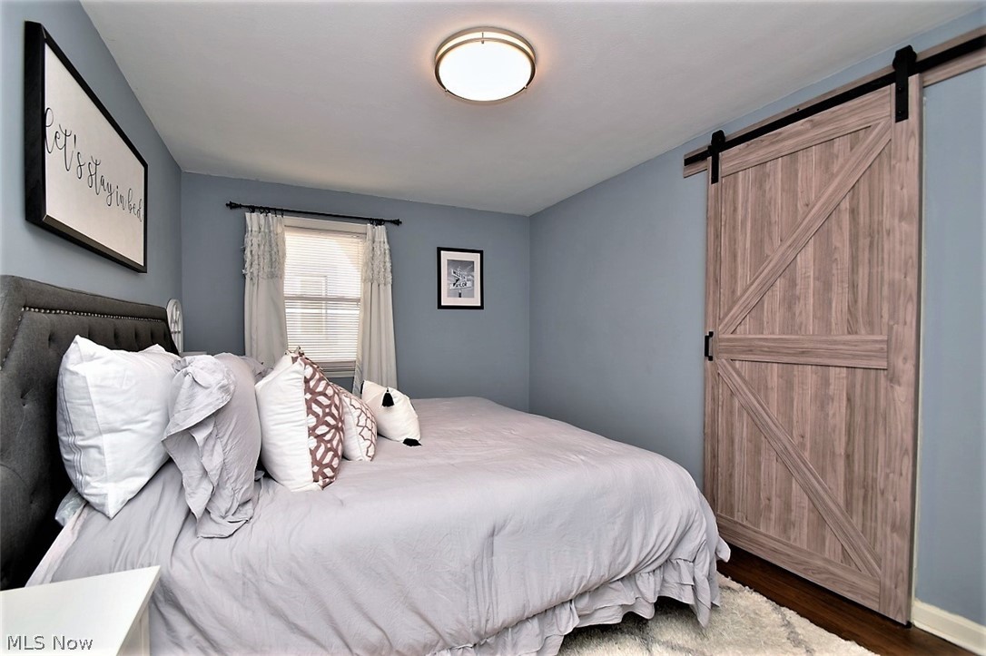 3574 Farland Road University Heights, OH 44118 - Photo 19 of 34 Lovely soft close barn door to separate master bedroom from dressing area.