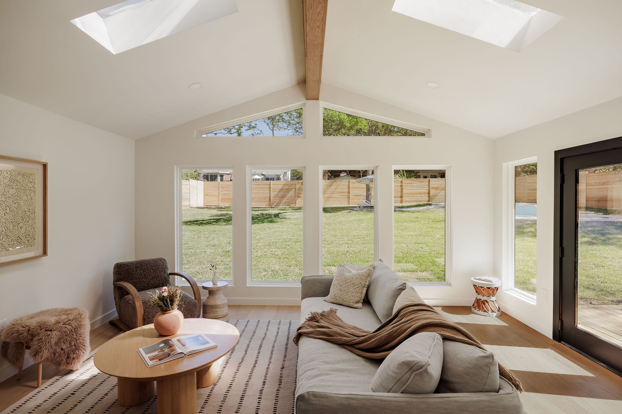 2210 Comburg Castle Way Austin, TX 78748 - Photo 12 of 40 a living room with furniture and a large window
