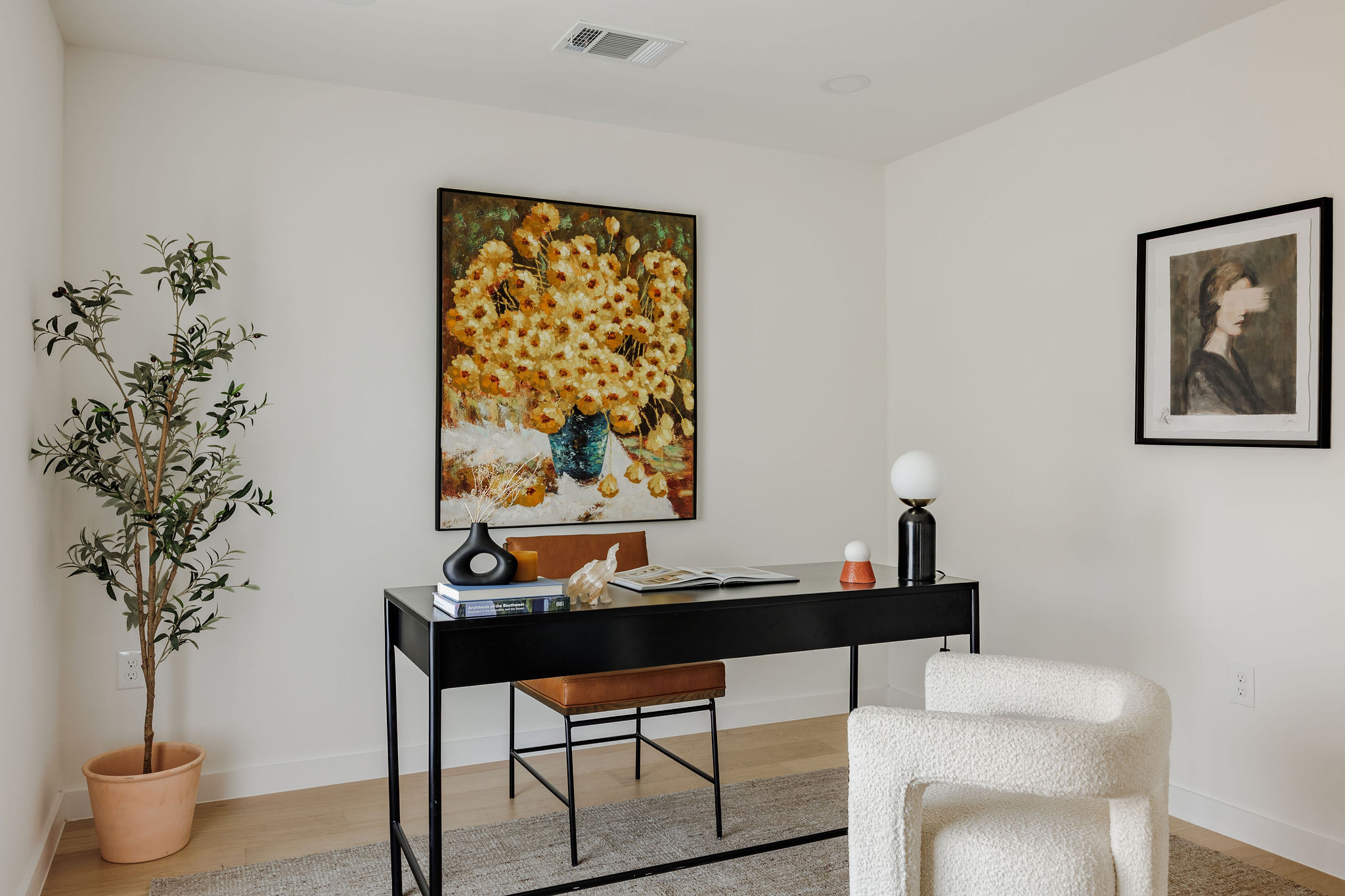 2210 Comburg Castle Way Austin, TX 78748 - Photo 22 of 40 a living room with a potted plant and a potted plant