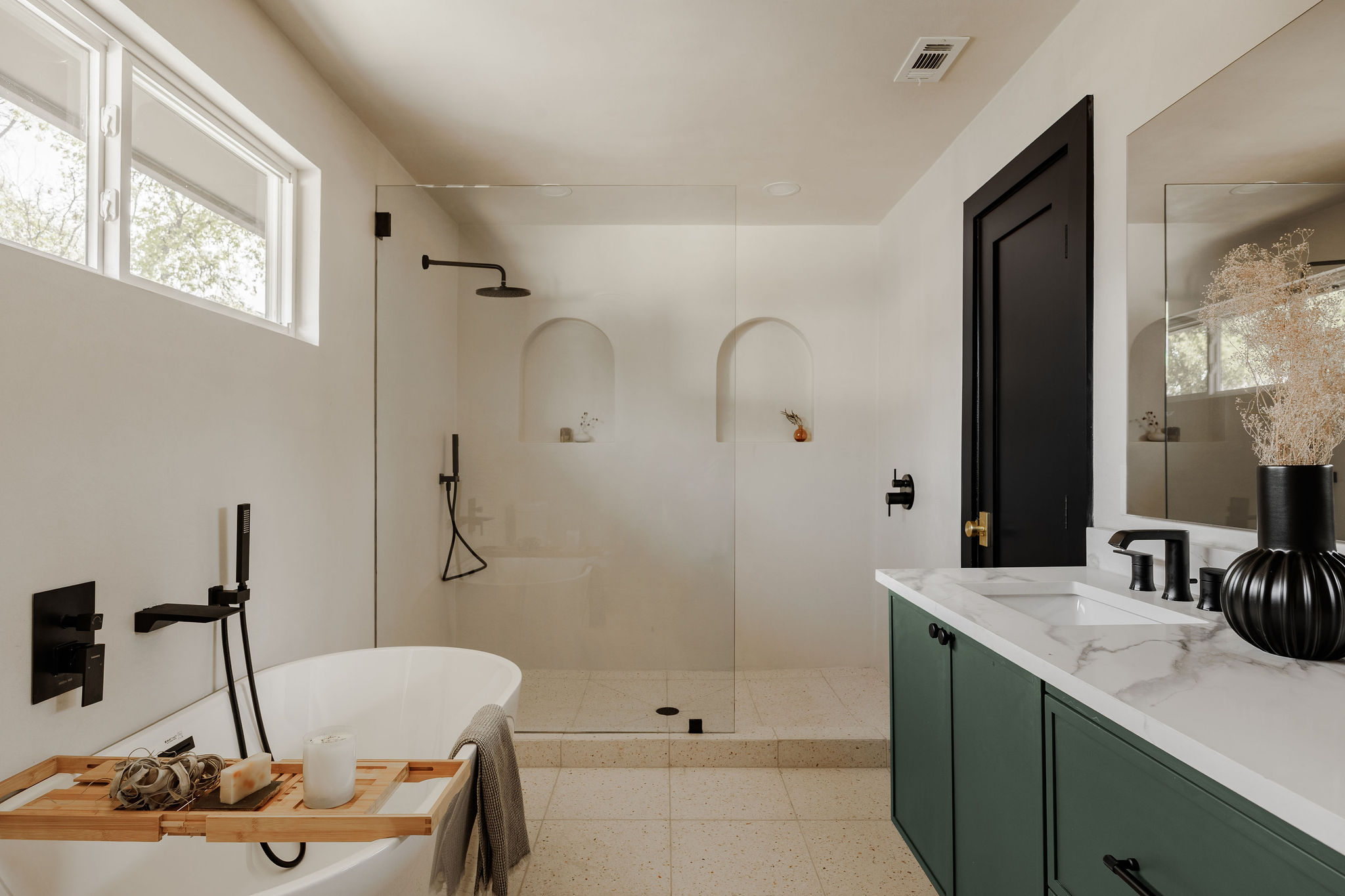 2210 Comburg Castle Way Austin, TX 78748 - Photo 26 of 40 a bathroom with a tub sink and mirror