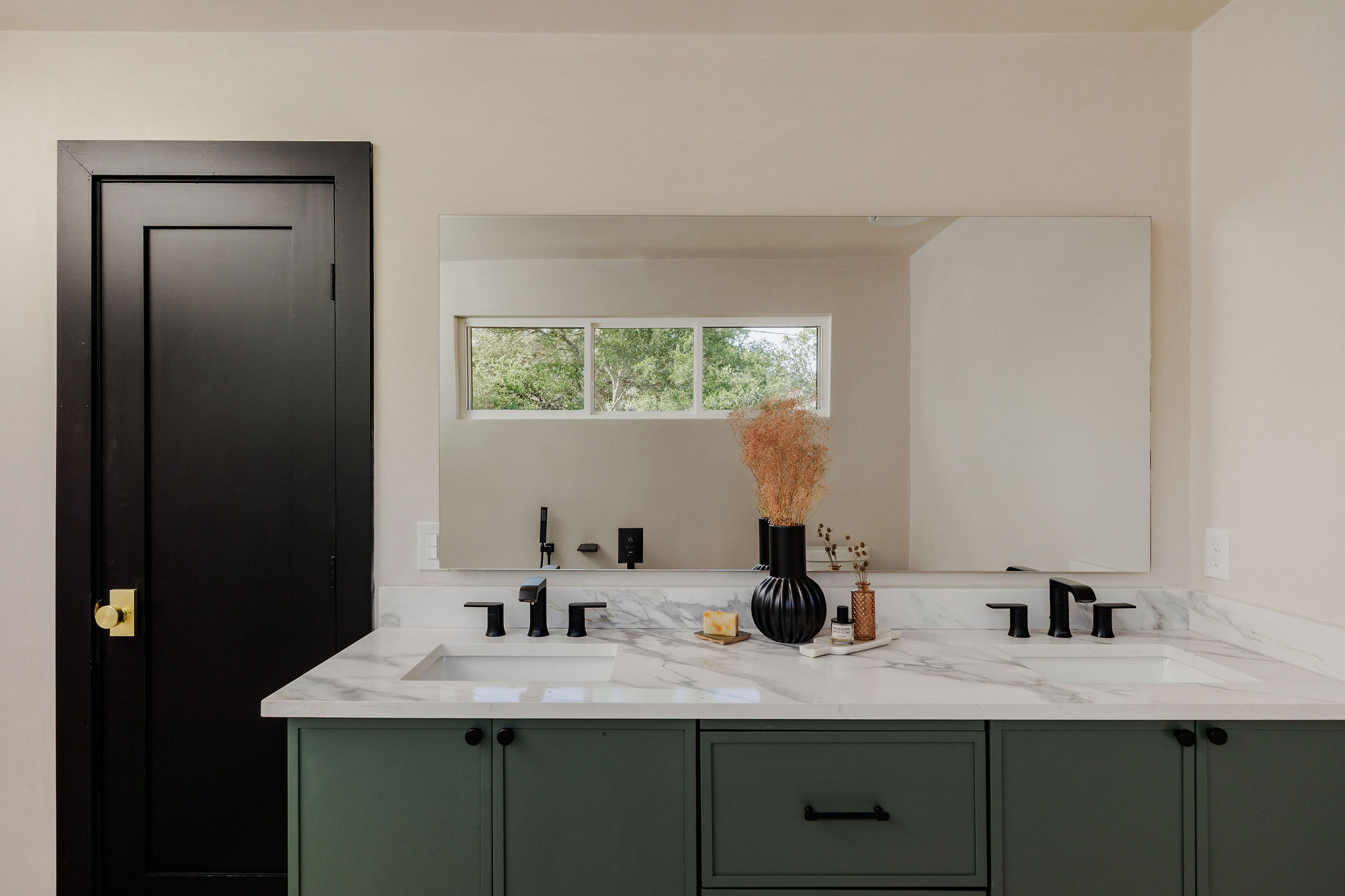 2210 Comburg Castle Way Austin, TX 78748 - Photo 29 of 40 a bathroom with a granite countertop sink and a mirror