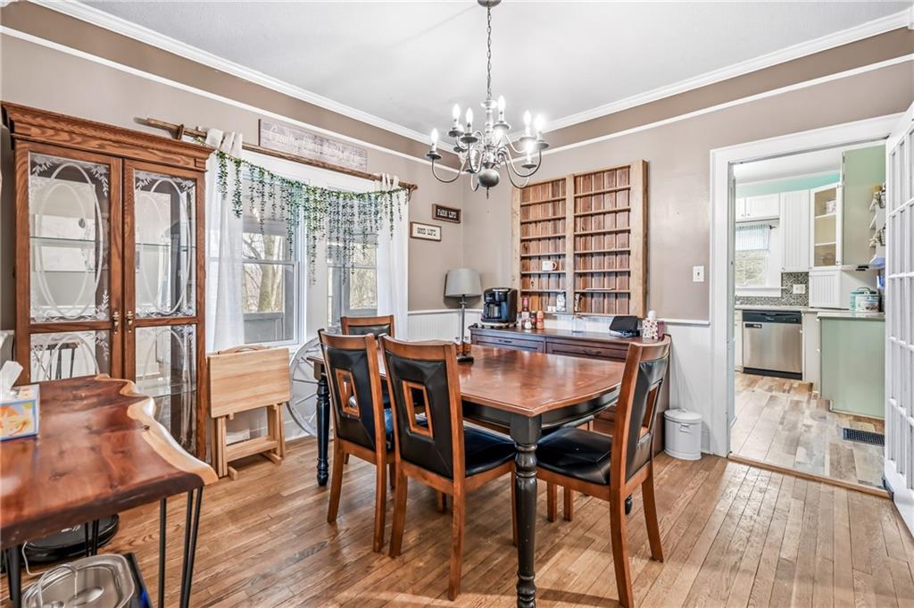 2411 Graceland Road New Castle, PA 16105 - Photo 11 of 50 a view of a dining room with furniture window and wooden floor