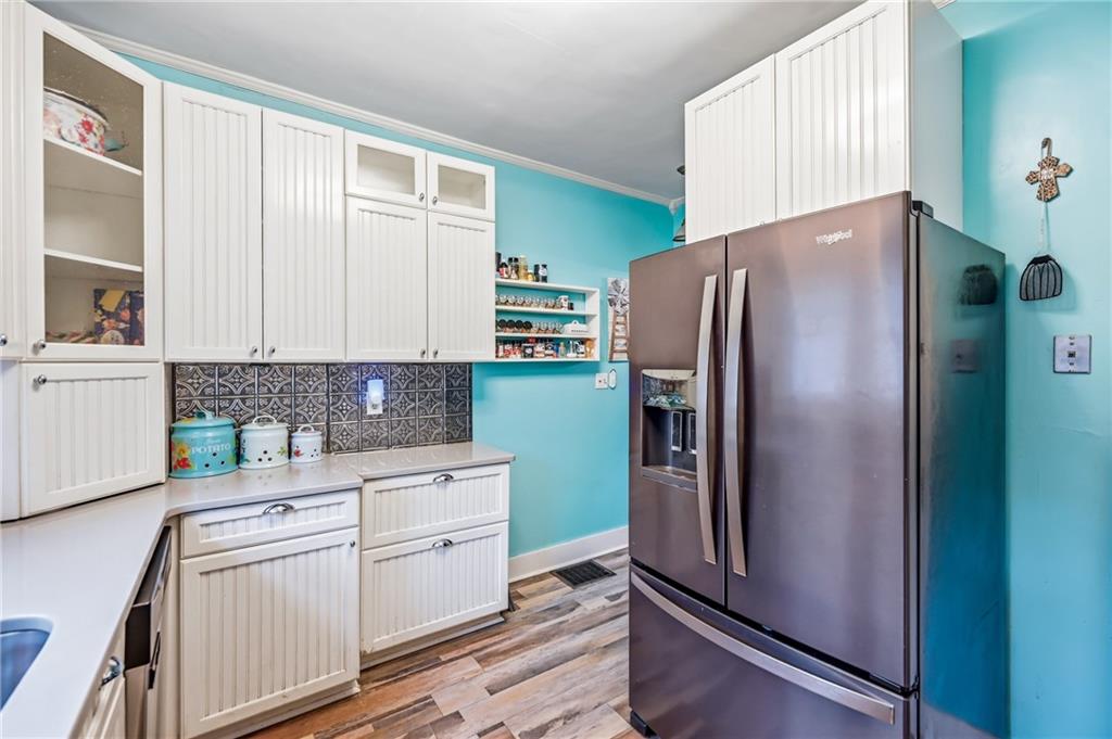 2411 Graceland Road New Castle, PA 16105 - Photo 13 of 50 a kitchen with a refrigerator sink and cabinets