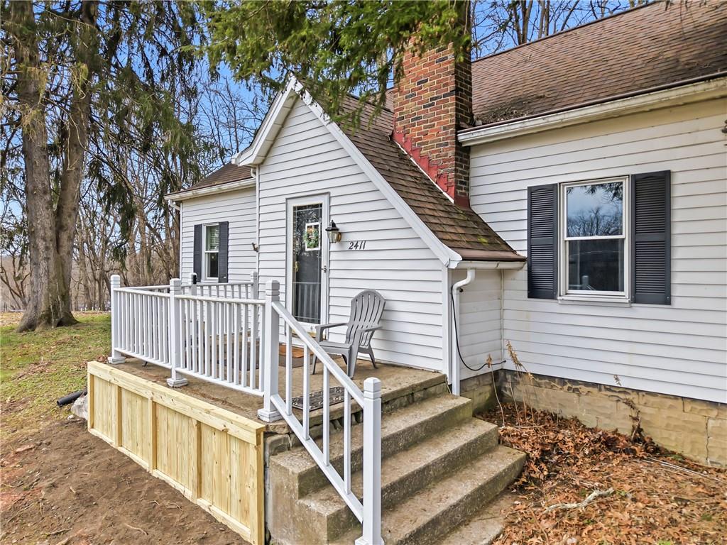 2411 Graceland Road New Castle, PA 16105 - Photo 2 of 50 a view of a house with wooden deck