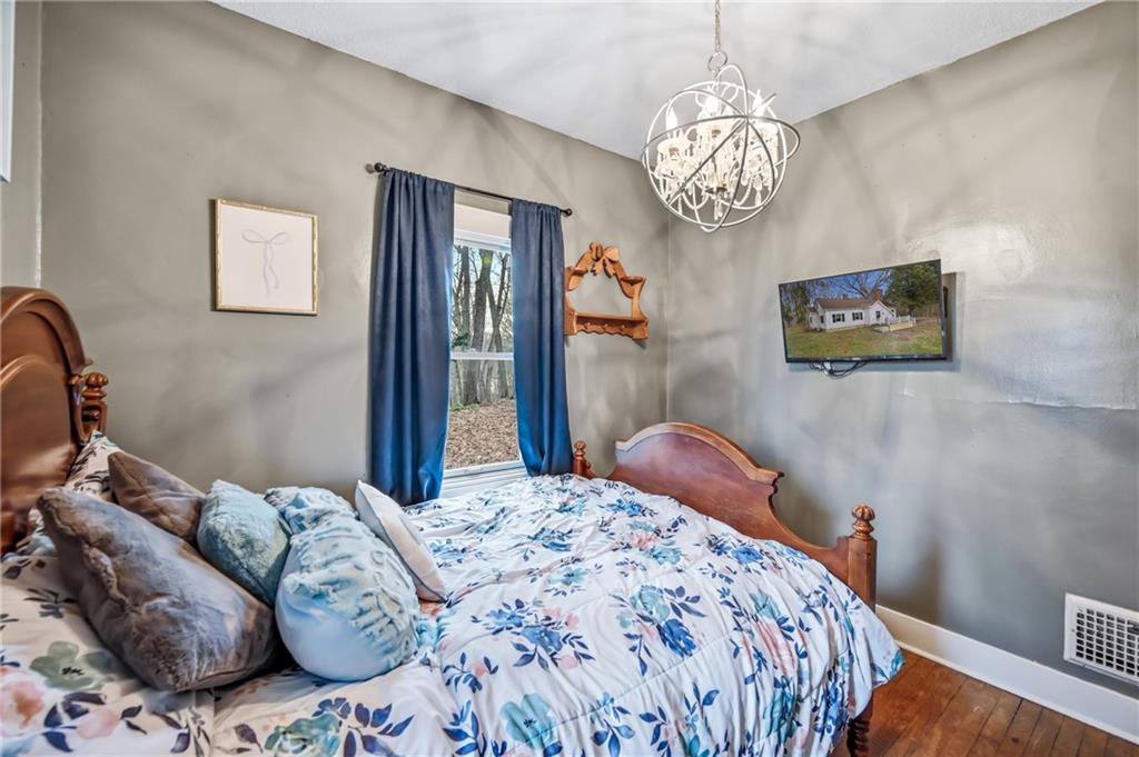 2411 Graceland Road New Castle, PA 16105 - Photo 21 of 50 a bedroom with a bed and a window