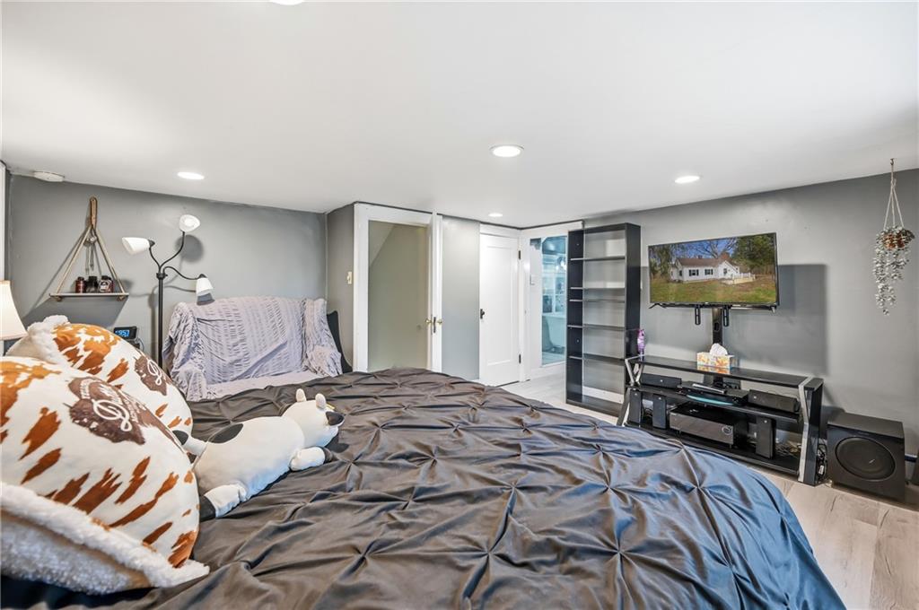 2411 Graceland Road New Castle, PA 16105 - Photo 23 of 50 a bedroom with a bed and a table in it