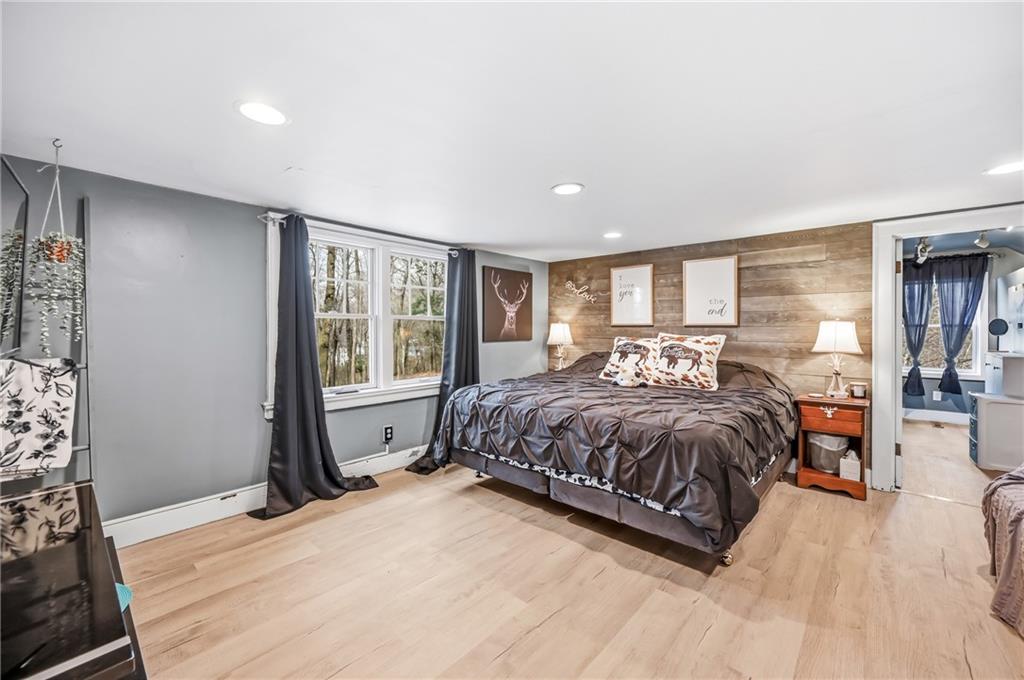 2411 Graceland Road New Castle, PA 16105 - Photo 24 of 50 a spacious bedroom with a large bed and a window