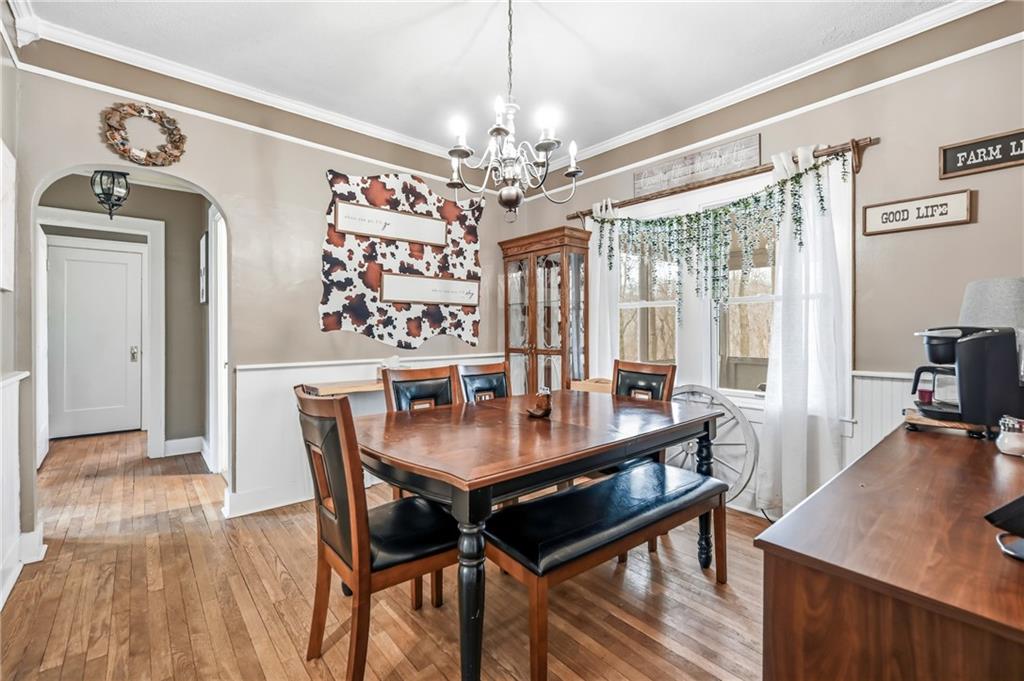 2411 Graceland Road New Castle, PA 16105 - Photo 10 of 50 a view of a dining room with furniture window and wooden floor