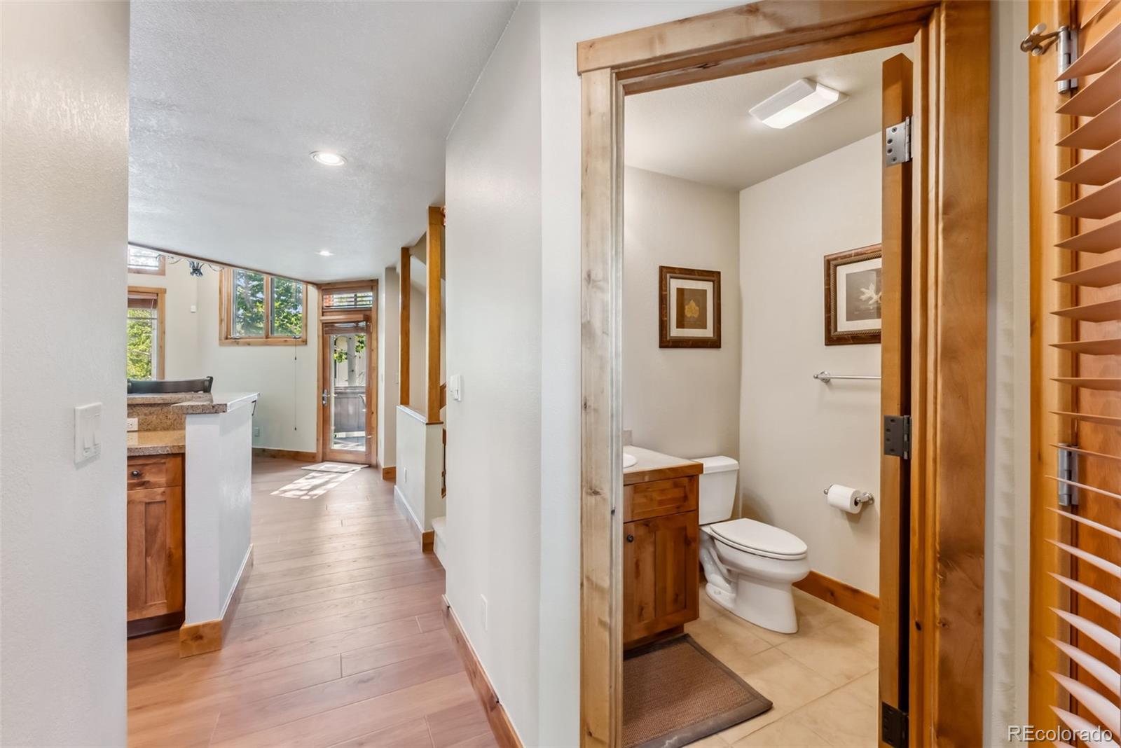 0024 Rasor Drive Dillon, CO 80435 - Photo 14 of 37 a bathroom with a toilet sink and a mirror