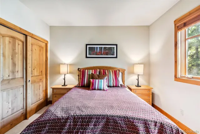 a en suite bathroom with a granite countertop sink a mirror a shower and a bathtub
